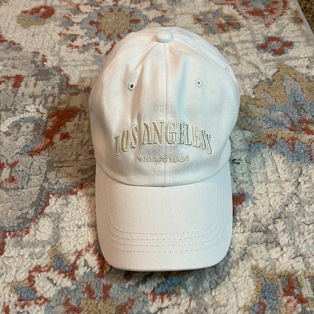 white LA baseball cap
